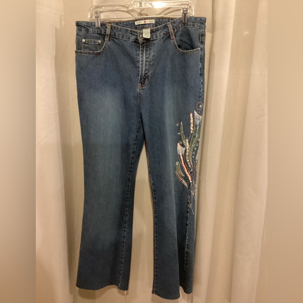 Boot cut jeans with sequined embroidery